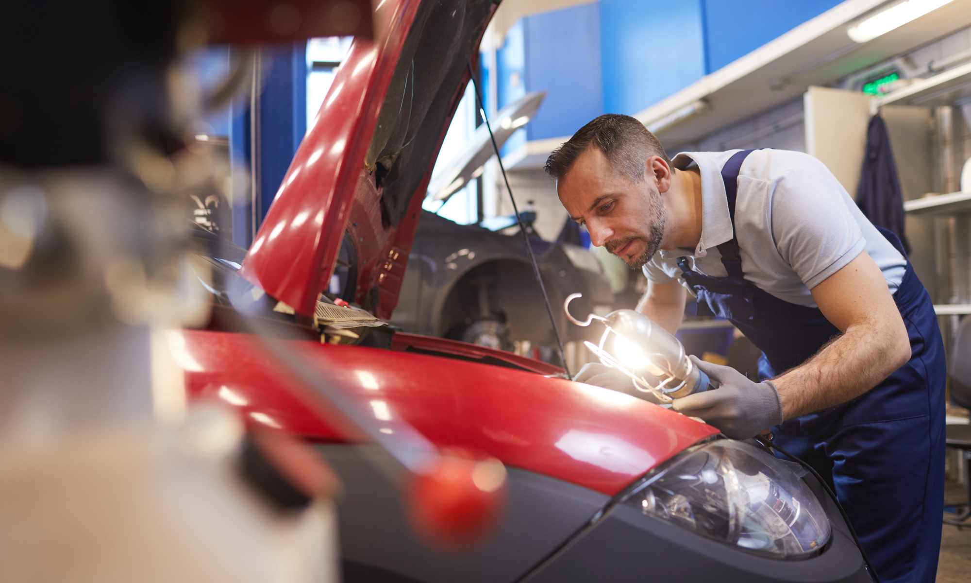 Mechanic Inspecting Car In Garage Workshop 2022 02 02 04 48 43 Utc